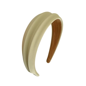 Elegant beige padded sponge headband for women with premium fabric finish on white background
