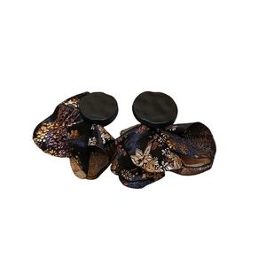Vintage round floral drop earrings with black base and golden fabric texture accents