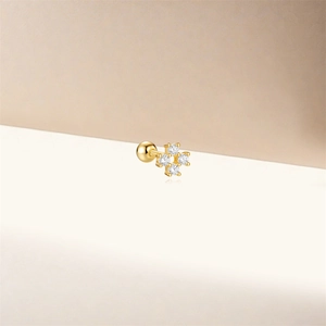 Macro shot of S925 silver gold-plated stud featuring four clear cubic zirconia stones