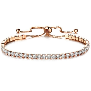 Detail of rose gold tennis bracelet with adjustable slider clasp and sparkling crystals