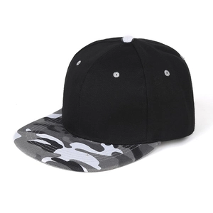 Detail of a black snapback hat with grey camouflage brim and white eyelets on white background
