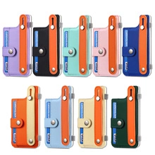 Detailed close-up of 9 colors of adhesive phone card holders with pull-tab buckle design