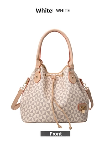 Close-up of beige geometric bucket bag with orange edges and drawstring closure