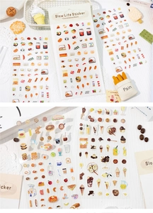 Close-up of food stickers featuring mini hand-drawn desserts and convenience store snacks