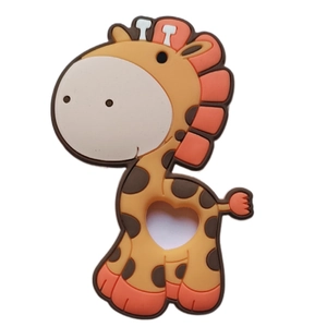 Close-up of a yellow giraffe silicone baby teether with a heart-shaped hollow center