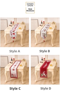 Detailed view of woven Christmas table runners with gnomes and reindeer patterns