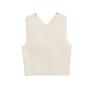 Close-up detail of cream beige ribbed knit texture on backless sleeveless top
