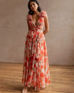 Detail of floral ruffle maxi dress with deep V-neck, waist ring cutout and chiffon texture