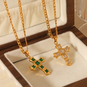 Gold stainless steel Figaro chain necklace with green and white zircon cross pendants