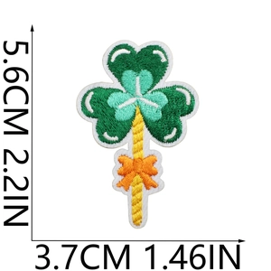 Detailed view of shamrock lollipop embroidery patch with dimensions 5.6cm x 3.7cm