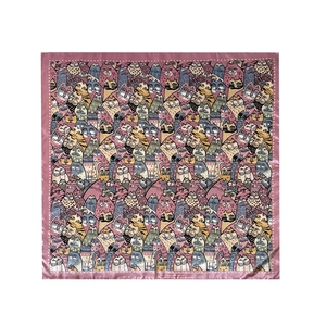Flat lay of 90cm square satin scarf featuring cat illustration and pink polka dot border