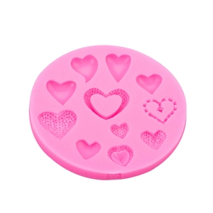 Pink heart-shaped silicone mold with 11 different cavities for DIY fondant and chocolate