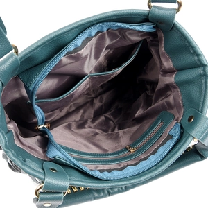 Interior view of dark green bag featuring grey lining with zipper pocket and compartments