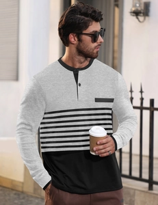 Detail of grey and black striped Henley shirt showing buttoned collar and soft knit fabric