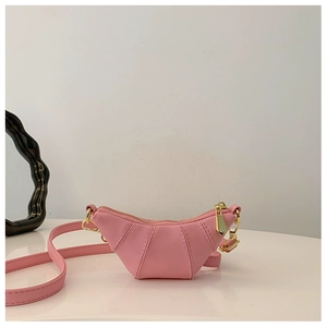 Pink croissant-shaped crossbody bag for children featuring high-quality leather and gold zipper