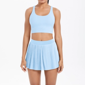 Two-piece light blue yoga set with sports bra and pleated tennis skirt for fitness