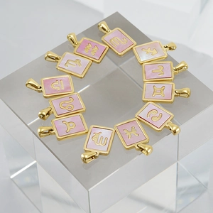 Collezione di 12 ciondoli zodiacali in acciaio inossidabile dorato 18K e madreperla
