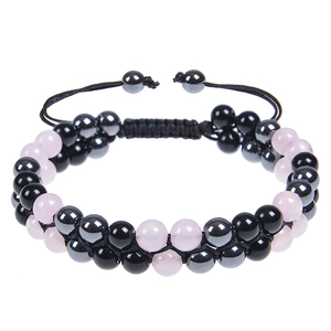 Close-up of double-layer beaded bracelet with pink quartz and magnetic stone beads