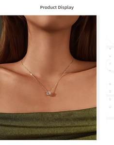 Close-up of elegant gold chain with a round pink zircon pendant on a woman's neck