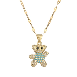 Golden bear necklace with turquoise zircon crystals shown on a clean white background