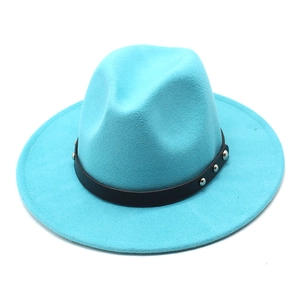 Detail of teal wool fedora hat featuring a black leather band with silver metal rivets