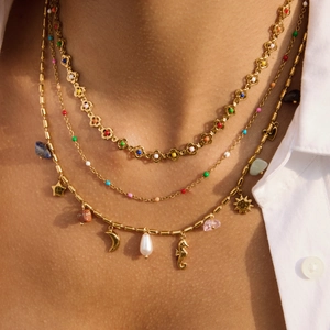 Layered 18K gold stainless steel necklace with colorful beads and celestial pendants