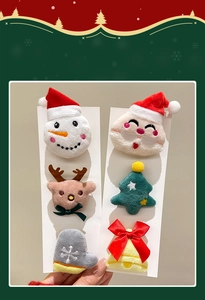 Close-up of 6-piece plush Christmas hair accessory set featuring Santa and reindeer motifs