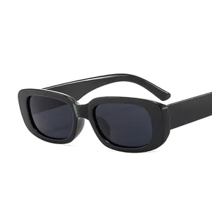 Fashionable small square black sunglasses with thick frames shown at a 45-degree angle