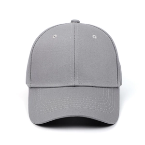 Detail view of the breathable cotton twill texture and stitching on a grey baseball cap