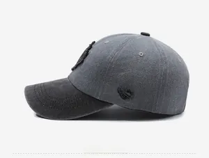 Detailed side view of washed cotton baseball cap with Canada maple leaf patch