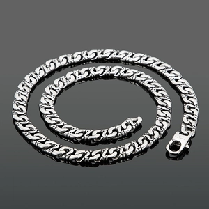 Detail of 10mm stainless steel chain necklace showing 316L material engraving