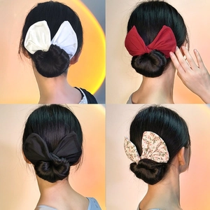 Elegant bow hair bun makers in white, red, black, and floral patterns for women styling