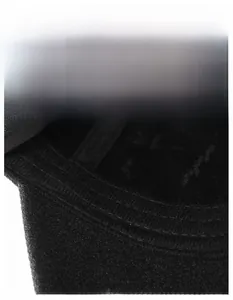 Detail view of the wide moisture-wicking sweatband inside a warm winter baseball cap