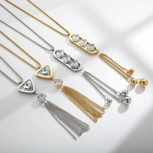 Elegant gold and silver tassel necklaces with geometric pendants and zircon stones
