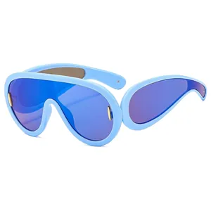 Occhiali da sole monopezzo oversize blu alla moda con stile punk futuristico