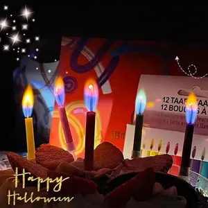 Twelve colorful birthday candles with vibrant multi-colored flames for party decoration