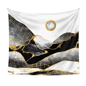 Detail view of abstract mountain tapestry with golden lines and artistic moon pattern
