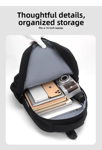 Interior detail of black backpack showing a padded pocket for 14-inch laptops