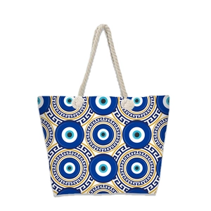 Detail of Mediterranean evil eye tote bag with canvas texture and rope handles