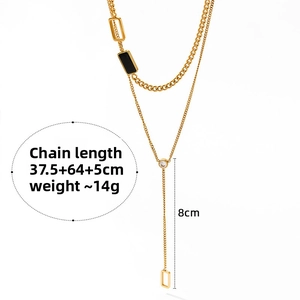 Detail of gold double-layered Y-necklace with black pendant and crystal showing dimensions