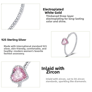 Detailed macro view of 925 silver ring featuring pink heart zircon and twisted band