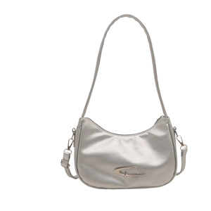 Silver crescent moon shoulder bag with metallic finish and star logo detail