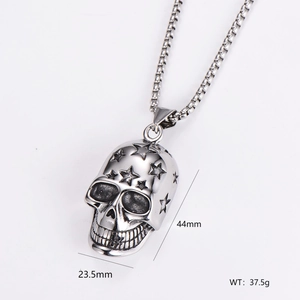 Detailed view of skull pendant showing dimensions 44mm height and 23.5mm width
