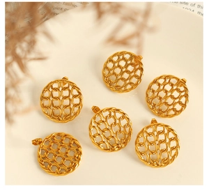 Detailed macro shot of gold plated titanium steel earrings with woven mesh design