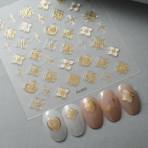 Retro gold embossed nail stickers with intricate star and heart hollow patterns
