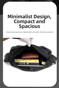 Detail view of the large capacity interior of this waterproof black crossbody bag
