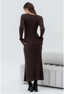 Rear view of brown ribbed knit maxi dress showing slim fit and minimalist design