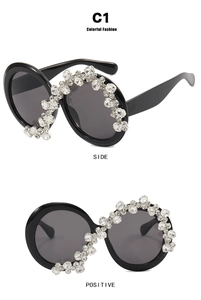 Detailed views of oversized round sunglasses with sparkling rhinestones and dark lenses