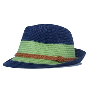 Close-up of tricolor woven straw fedora featuring navy, green sections and brown rope detail