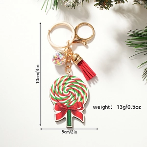 Christmas lollipop keychain with red bow, colorful star glass ball, and red tassel decor